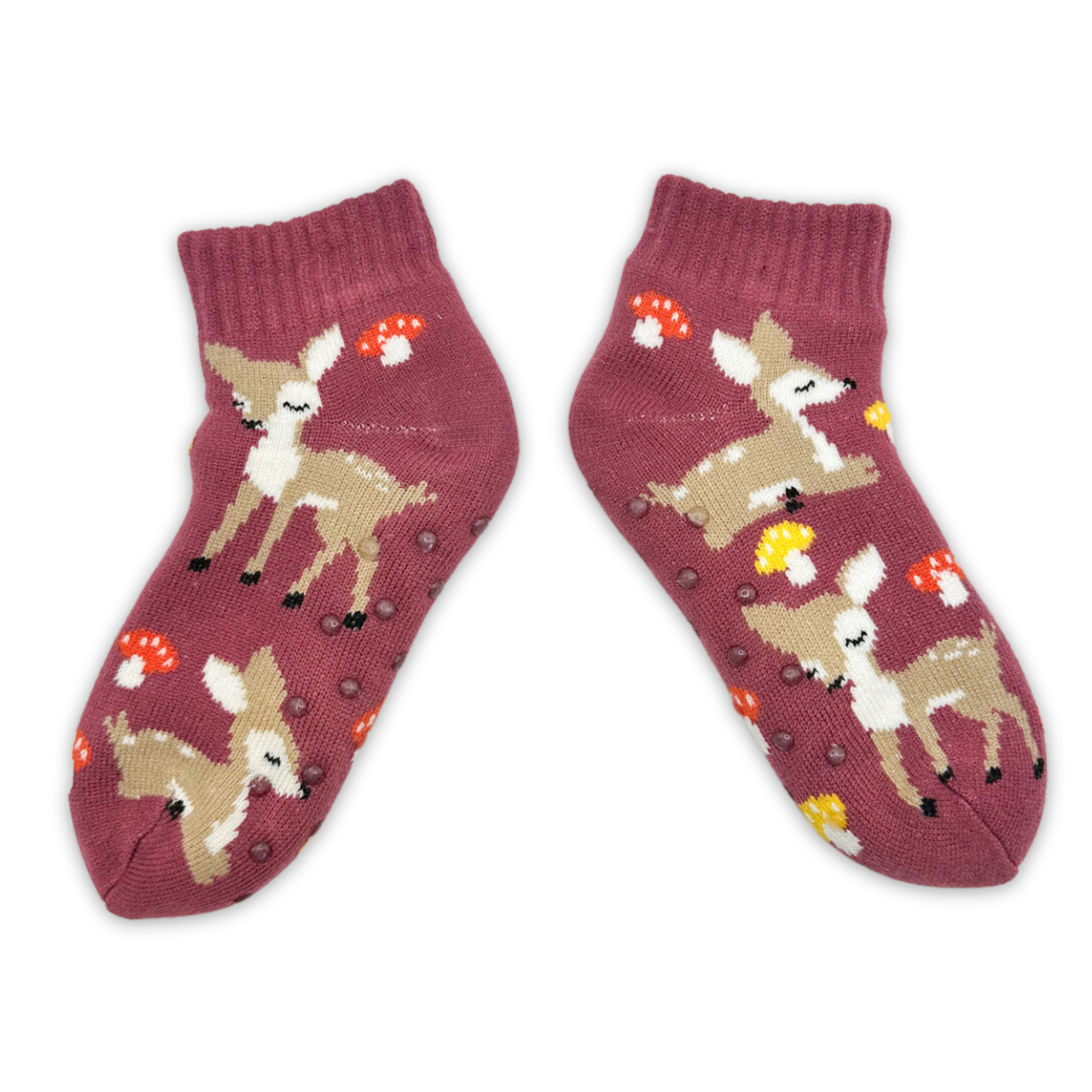 maroon slipper sock with deer and mushroom pattern