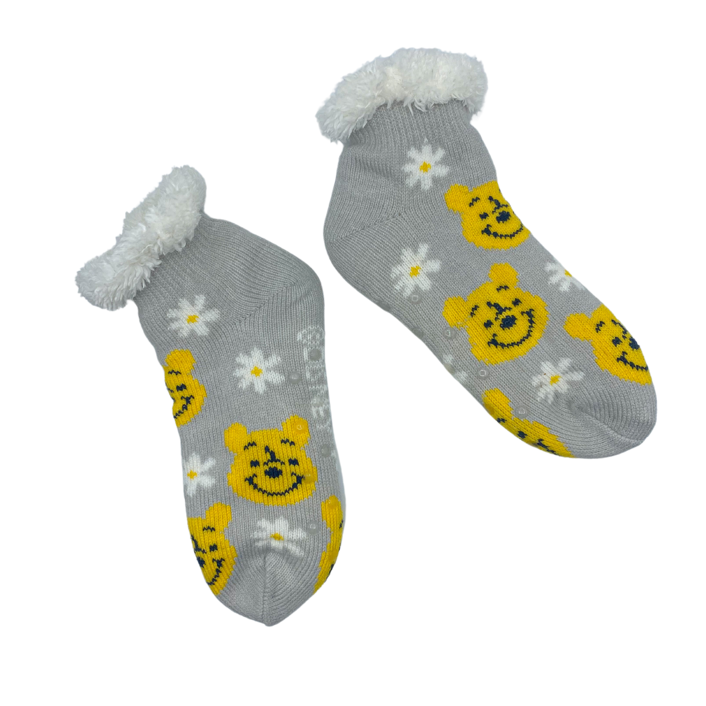 One grey cozy warmer sock featuring an alternating pattern of Winnie the Pooh face in its original color and a white seven-petaled flower with an yellowish orange core.