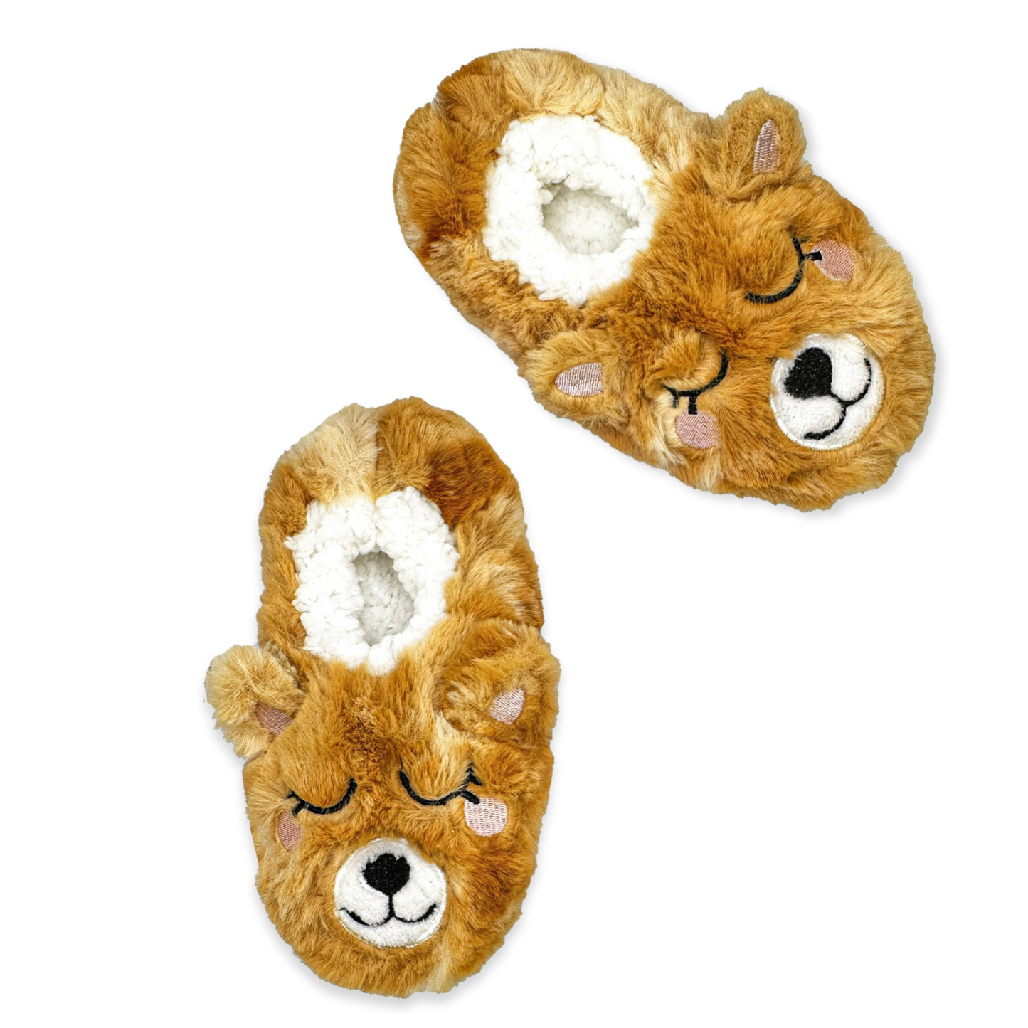 A pair of pink slippers with a smiling bear face on them