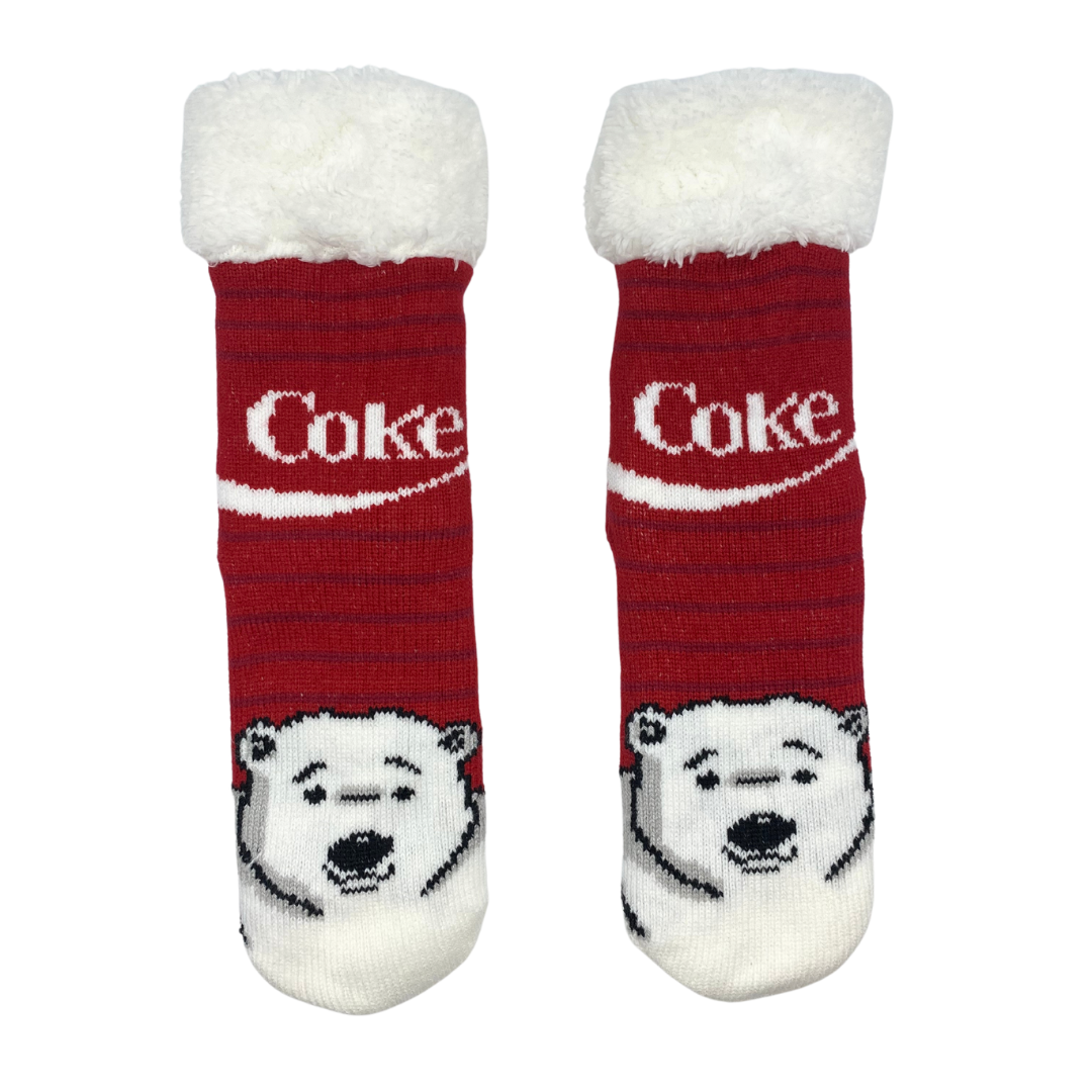 One pair of sock featuring a the Coca Cola bear with the Coke logo appearing above.
The sock features rubber dot grippers on the bottom and a white sherpa lined cuff.