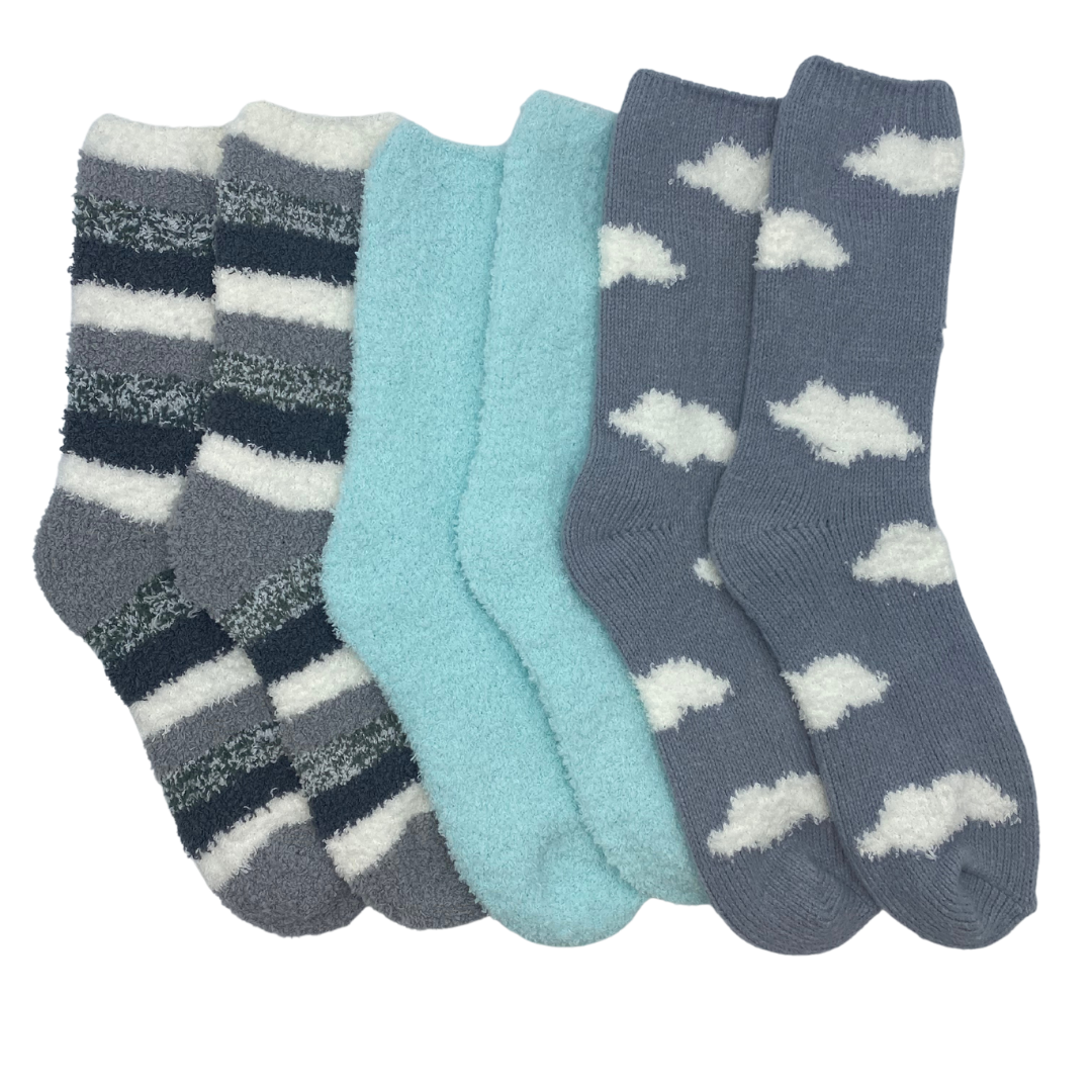 Three pairs of socks.

The first consists of a greyish blue background with white clouds printed all over.

The second is a plain light blue colored sock.

The third consists of stripes in white, black, and grey colors.
