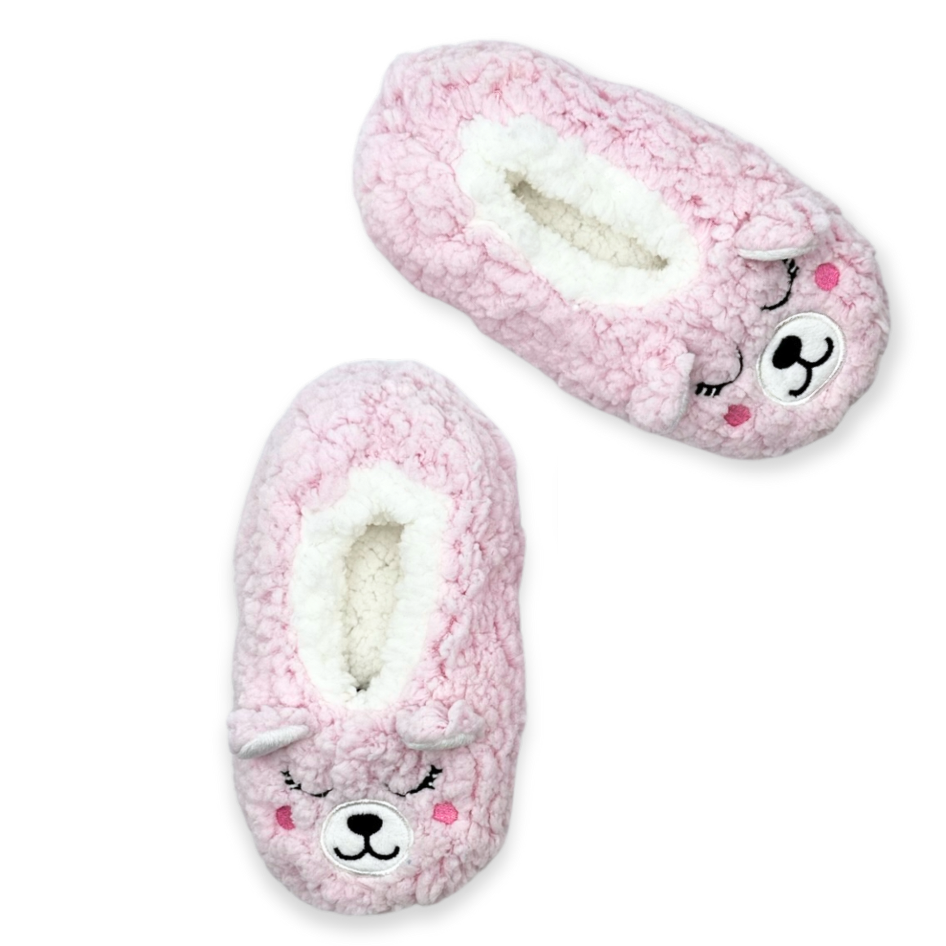  A pair of pink slippers with a bear face on them